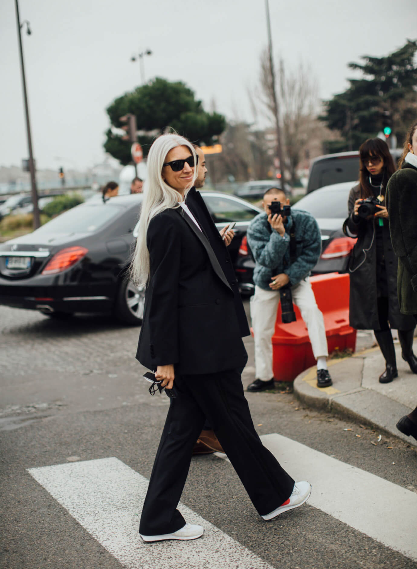 white sneakers with a black suit