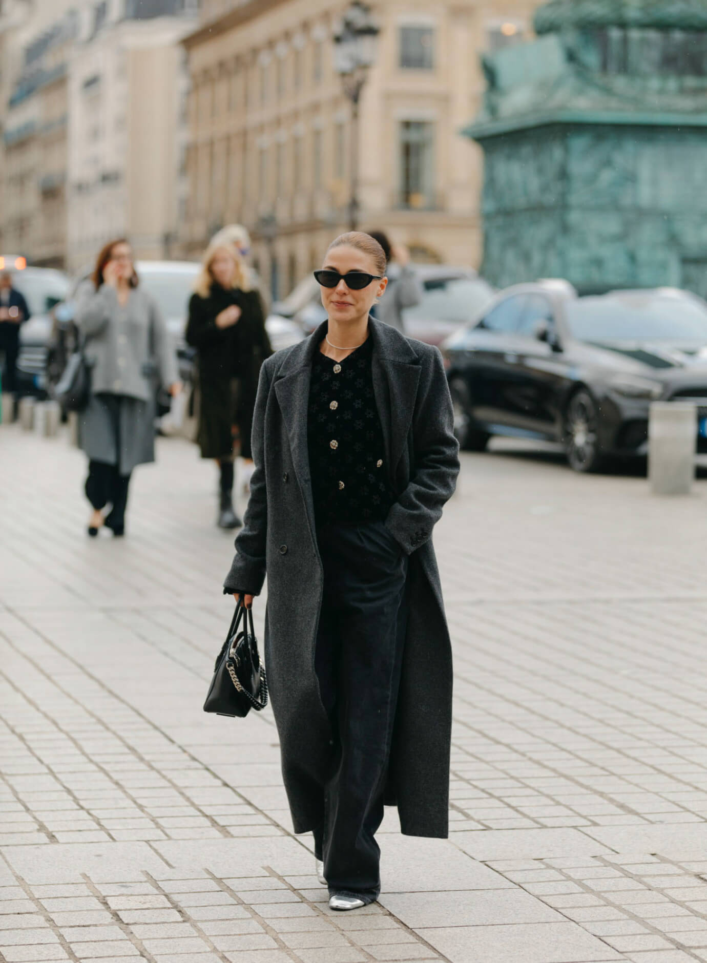 french fall outfits cardigan, long wool coat and straight-leg jeans