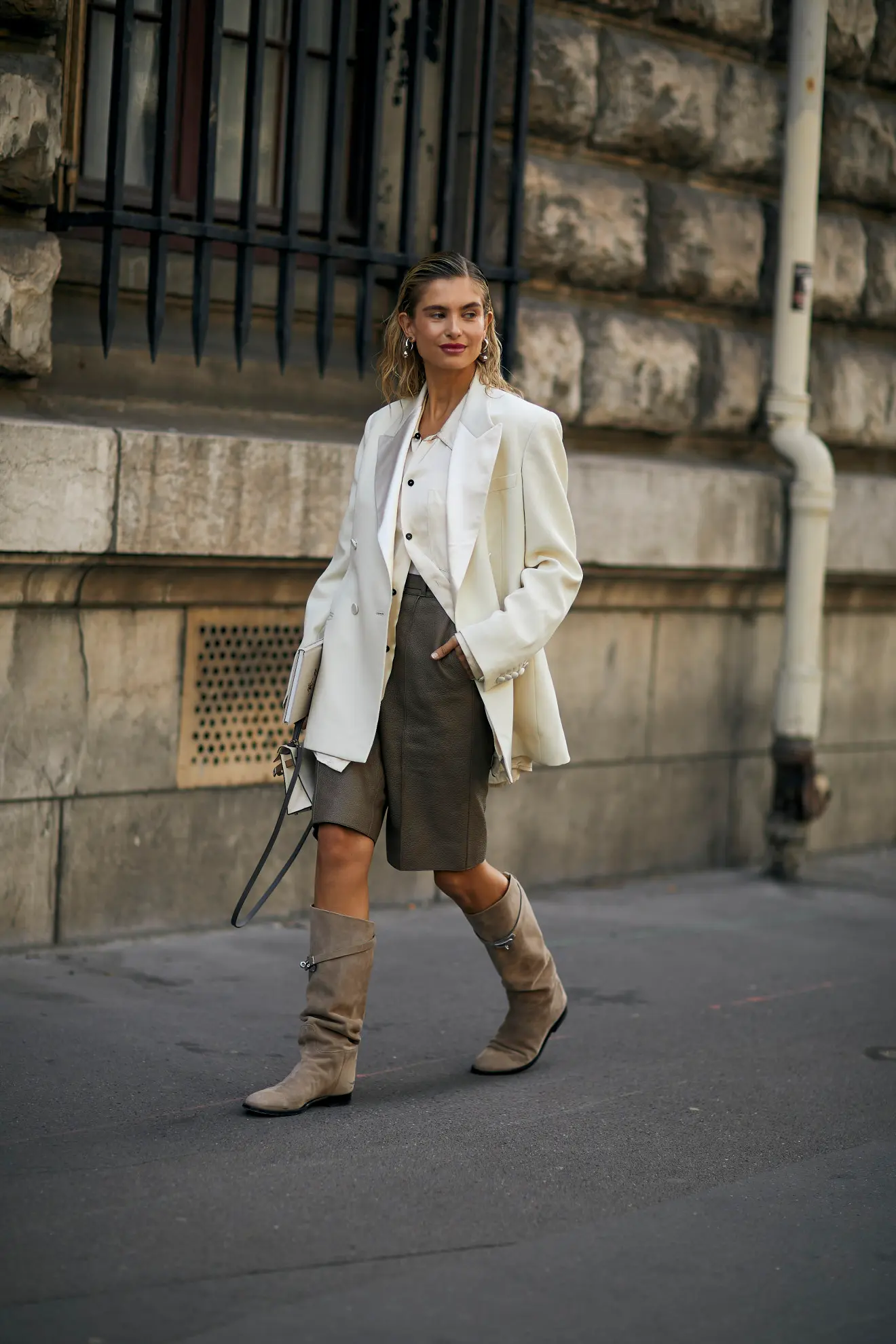 a woman at Paris fashion week street style wearing 
