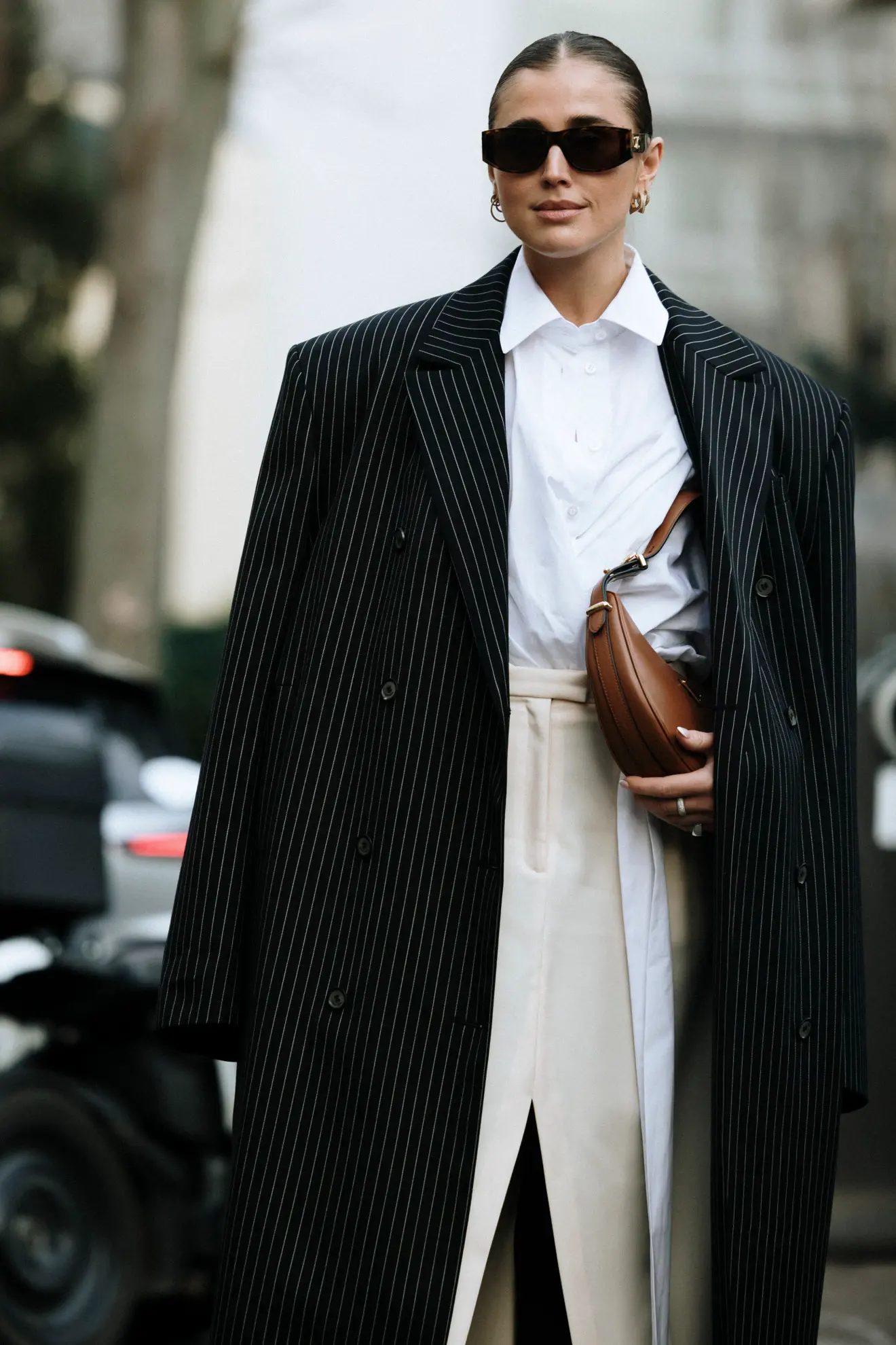 street style paris ss24 couture pinstripe coat